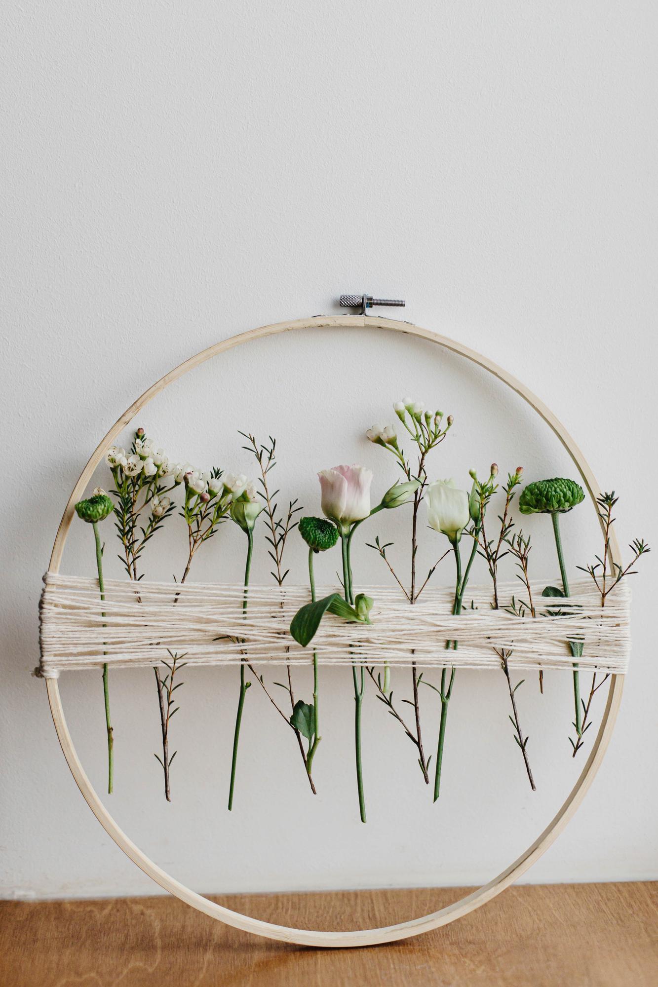 studio window with hoop and threads